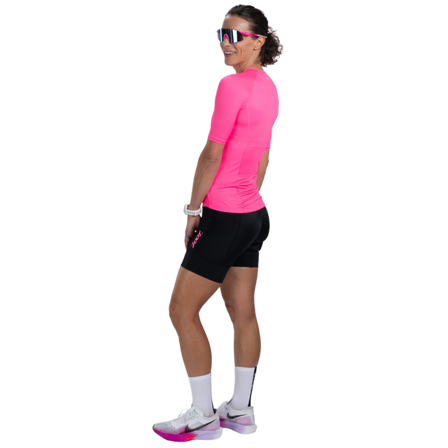 Zoot Women's Core Tri Jersey in Bright Pink colourway - back angle view